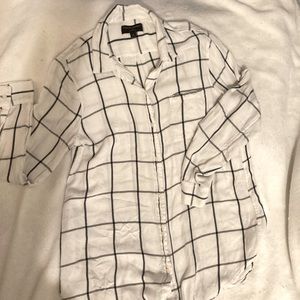 Banana Republic fit button down. White shirt featuring a black plaid pattern.